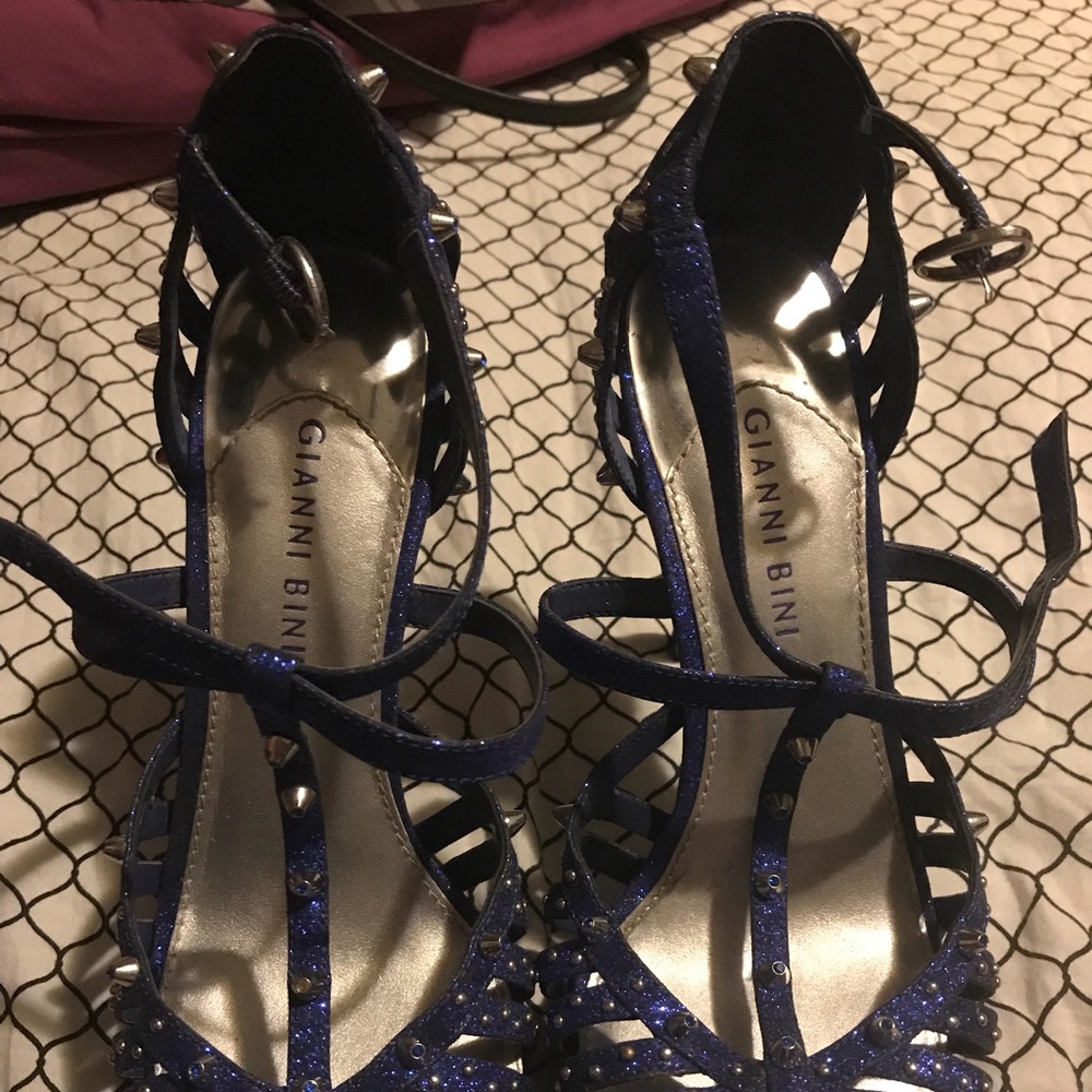 Blue spiked heels.